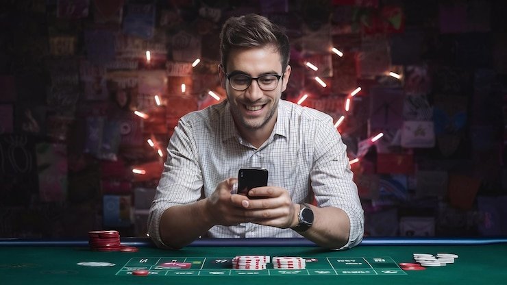 Filipino player reviewing jilijili promotion details on mobile phone